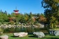 Beautiful view of Kagamiike Mirror Pond against Tahoto Pagoda in Japanese garden. Public landscape park of Krasnodar Royalty Free Stock Photo