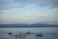 Beautiful view of Kamali Beach with traditional fishing boats in Baubau City, Southeast Sulawesi, Indonesia