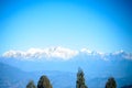 Beautiful view of Kanchenjunga mountain range and daylight on it. View from Batasia Loop Darjeeling in a clear blue sky and sunny
