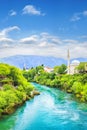 Beautiful view of the Karadjozbegov mosque jamia on the banks of the Neretva River in Mostar, Bosnia and Herzegovina