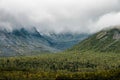 Beautiful view of the Khibiny Mountains in the fog in summer