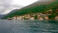 Beautiful view of the Kotor Bay between Croatia and Montenegro. Panormama on the mountains and dimiki with tiled roofs.