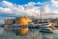 Beautiful view of Kyrenia Harbour Girne Limani, ancient castle and docked boats in a sunny day in Northern Cyprus Royalty Free Stock Photo