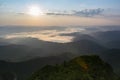 Beautiful view of Lake Bicaz covered with clouds at dawn. Eastern Carpathians, Romania Royalty Free Stock Photo