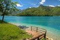 Beautiful view of the lake of Lago di Ledro in Italy, Europa with clear water and sunny trees Royalty Free Stock Photo