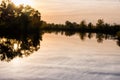 Beautiful view of the lake at sunset. Calm, warm evening on the lake. outdoor recreation. Royalty Free Stock Photo