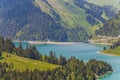 Beautiful view of a lake surrounded by mountains in Longrin lake and dam Switzerland, Swissalps