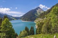 Beautiful view of a lake surrounded by mountains in Longrin lake and dam Switzerland, Swissalps