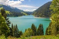 Beautiful view of a lake surrounded by mountains in Longrin lake and dam Switzerland, Swissalps