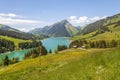 Beautiful view of a lake surrounded by mountains in Longrin lake and dam Switzerland, Swissalps