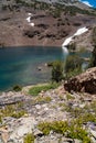 Beautiful view of the 20 Lakes Basin in Californias Eastern Sierra Nevada. Valley with lake, wildflowers and cliffs along the Royalty Free Stock Photo