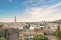 Beautiful view of the Lamberti Tower and Ponte Pietra on the banks of the Adige River in Verona, Italy Royalty Free Stock Photo