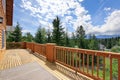 Beautiful view large wooden balcony in cabin style home. Royalty Free Stock Photo