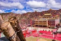 Beautiful view of the Larung Gar or Serta Tibetan Monastery on a cloudy day, China Royalty Free Stock Photo