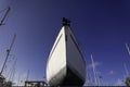 Beautiful view of the Lisbon yacht club at belem district near the Belem tower along the Tagus riverside. Small fishing boat and Royalty Free Stock Photo