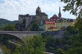 Beautiful view of Loket Castle with colorful buildings by summer sunny day. Bohemia, Sokolov, Karlovarsky Region, Czech Republic