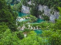 Beautiful view of the lush forest with majestic cliffs and waterfalls. Plitvice Lakes National Park Royalty Free Stock Photo