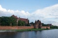 Beautiful view of Malbork castle next to the river. Fort and buildings