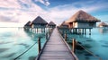 Beautiful view at Maldivas water villas with wooden walkway above the ocean water, connecting bungalows to island