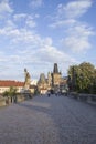 Beautiful view of the Malostranska tower of Charles Bridge at dawn in Prague