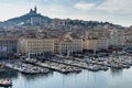 Beautiful view of Marseille old Port and Notre Dame de la Garde basilica, France Royalty Free Stock Photo