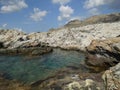 Beautiful view of the Mediterranean Sea and the coast near the Eparchiaki Odos Pilonas-Katavias road. Rhodes Island, Greece Royalty Free Stock Photo