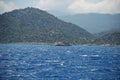 Beautiful view of the Mediterranean Sea and rocky shore under the blue sky