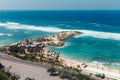 Beautiful view of Melasti Beach. Blue sea with waves, clear sky and white sand in Indian Ocean, South Kuta, Bali Royalty Free Stock Photo