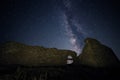 Beautiful view of Milky Way galaxy over the ruins of Enisala citadel