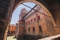 Beautiful view of the moated medieval Este Castle in the center of Ferrara, Italy.