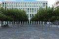 Beautiful view of modern building with big windows and trees outdoors Royalty Free Stock Photo