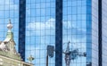 Beautiful view of a modern building with crane reflection