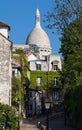 Beautiful view of Montmartre street and the Sacre-Coeur basilica in the background, France.