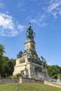 Beautiful view of the monument Niederwalddenkmal. Tourists admiring the tall Germania sculpture