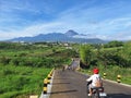 The beautiful view of Mount Kawi, East Java, can be seen from the main road and there are also several motorbikes there Royalty Free Stock Photo