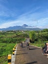 The beautiful view of Mount Kawi, East Java, can be seen from the main road and there are also several motorbikes there Royalty Free Stock Photo