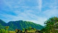 Beautiful view of Mount Papandayan with white clouds against a bright blue sky Royalty Free Stock Photo