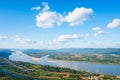 Beautiful view from Mountain green valley stream landscape to Mekhong river and clouds on the blue sky, Nongkai, Thailand