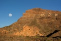 Beautiful view of the mountain ridge at sunset with full moon on Royalty Free Stock Photo