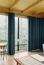 beautiful view of the mountains from the bathroom. modern interior in a house in nature Royalty Free Stock Photo