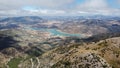 Beautiful view with mountains, rocks and water lake with clouds sky, Dry Summer in Spain