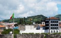 Beautiful view of the mountains, roofs of houses and streets of the city of Ponta Delgada, Portugal. Royalty Free Stock Photo