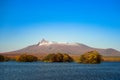 Beautiful view of Mt. Komagatake taken from Onuma park, Hakodate, Hokkaido, Japan. During autumn season with clear blue sky.