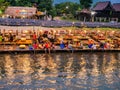 Beautiful view of nam song river with Tourist on riverside restaurant and the mountain in the night at Vangvieng city Lao. Royalty Free Stock Photo