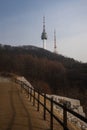 Beautiful view of Namsan Tower from Namsan trails during winter evening at Yongsan-gu , Seoul South Korea : 6 February 2023 Royalty Free Stock Photo