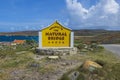 Beautiful view of Natural Bridge of Aruba sign on nature landscape background. Royalty Free Stock Photo