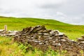 Beautiful view of a natural limestone fence in ruins in the Irish countryside the Burren