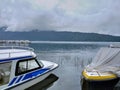 Beautiful view nature photography fog rain in Bedugul temple Bali Indonesia Rain boat Royalty Free Stock Photo