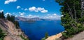 Panorama of Crater Lake, Wizard Island and the cliffs surrounding them Royalty Free Stock Photo