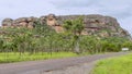 Beautiful view of Nourlangie Rock or Burrunggui in Kakadu Park on a sunny day with some clouds, Australia Royalty Free Stock Photo